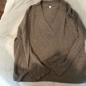 Margaret Oleary brown sweater